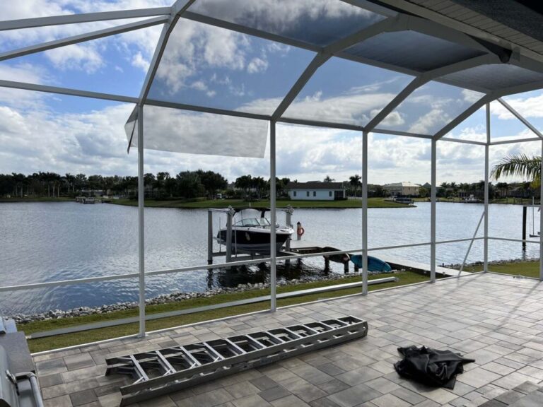 white screen enclosure and paver patio contractor building in Lithia FL Fishhawk Graco Construction - Patios and Enclosures in Lithia
